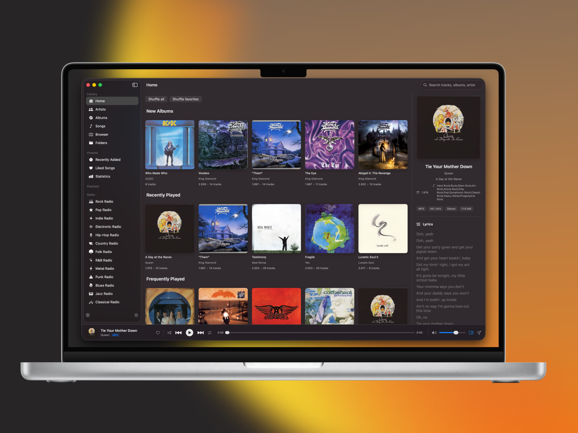 Orange Music Player — Home view with album grid, now playing sidebar, and dynamic theming